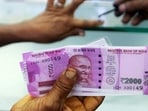 The RBI announced that 98% of  <span class='webrupee'>₹</span>2,000 notes have been returned since May 2023, with their total value dropping to  <span class='webrupee'>₹</span>7,117 crore. These notes can still be exchanged at RBI offices.