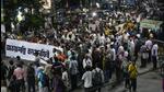 Members of the citizen forum including doctors walk in a rally protesting a rape and murder of a resident doctor in a government hospital early August, in Kolkata. (AP)