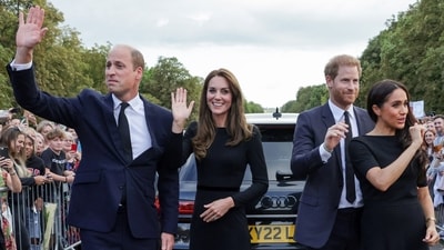 Meghan Markle might be preventing Harry from proposing a “olive branch” to the Prince and Princess of Wales, despite Kate's cancer diagnosis, according to Royal author Tom Quinn. (AFP) Meghan Markle might be preventing Harry from proposing a “olive branch” to the Prince and Princess of Wales, despite Kate's cancer diagnosis, according to Royal author Tom Quinn. (AFP)