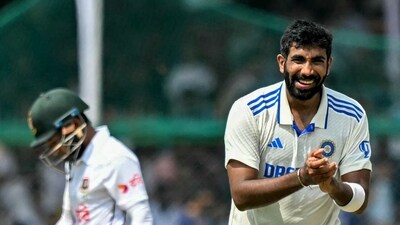 India's Jasprit Bumrah (R) celebrates after taking the wicket of Bangladesh's Mushfiqur Rahim (L) during the fifth and final day of the second Test cricket match between India and Bangladesh at the Green Park Cricket Stadium (AFP) India's Jasprit Bumrah (R) celebrates after taking the wicket of Bangladesh's Mushfiqur Rahim (L) during the fifth and final day of the second Test cricket match between India and Bangladesh at the Green Park Cricket Stadium (AFP)