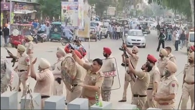 Cops open fire in the air to bring the situation under control in Zira, Ferozepur, on Tuesday. Cops open fire in the air to bring the situation under control in Zira, Ferozepur, on Tuesday.