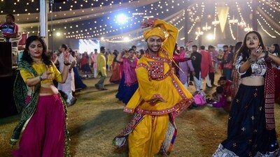 Performers dance Garba during the Navaratri in Ahmedabad. (AFP) Performers dance Garba during the Navaratri in Ahmedabad. (AFP)