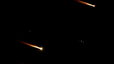 Rockets fly in the sky, amid cross-border hostilities between Hezbollah and Israel, as seen from Tel Aviv, Israel, October 1, 2024. REUTERS/Ammar Awad (REUTERS)