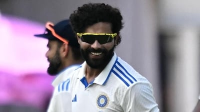 India's Ravindra Jadeja celebrates after reaching 300 Test wickets in Kanpur on Monday. (AFP) (HT_PRINT) India's Ravindra Jadeja celebrates after reaching 300 Test wickets in Kanpur on Monday. (AFP) (HT_PRINT)