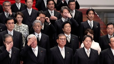 Japan's Prime Minister Shigeru Ishiba, center, and his cabinet ministers arrive for a photo session at Ishiba's residence in Tokyo, Japan, Tuesday, Oct. 1, 2024. (Toru Hanai, Pool Photo via AP) (AP) Japan's Prime Minister Shigeru Ishiba, center, and his cabinet ministers arrive for a photo session at Ishiba's residence in Tokyo, Japan, Tuesday, Oct. 1, 2024. (Toru Hanai, Pool Photo via AP) (AP)