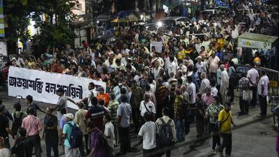 Members of the citizen forum including doctors walk in a rally protesting a rape and murder of a resident doctor in a government hospital early August, in Kolkata. (AP)