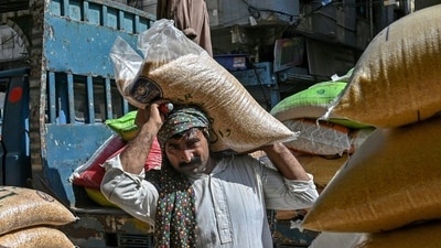 Pakistan's GDP rose 3.07% in the last quarter, aided by IMF funds and lower borrowing costs. The government anticipates 3.6% growth by June 2025, with strong agricultural performance and easing inflation contributing to recovery. (AFP) Pakistan's GDP rose 3.07% in the last quarter, aided by IMF funds and lower borrowing costs. The government anticipates 3.6% growth by June 2025, with strong agricultural performance and easing inflation contributing to recovery. (AFP)
