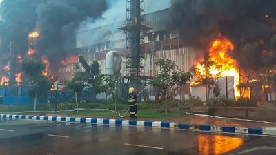 A fireman douses a fire breaking out at a chemical godown of the electronics component factory of Tata Electronics Pvt Ltd, in Hosur, Tamil Nadu. (PTI) A fireman douses a fire breaking out at a chemical godown of the electronics component factory of Tata Electronics Pvt Ltd, in Hosur, Tamil Nadu. (PTI)