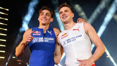 Swedish pole vaulter Armand Duplantis (L) and Norwegian hurdler Karsten Warholm pose after Duplantis won a head-to-head exhibition 100m sprint race on the sideline of the Diamond League in Zurich. (AFP)