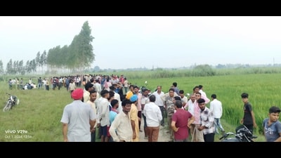 Villagers at the attack site in south Kheri forest division on Tuesday. (Deo Kant Pandey/HT) Villagers at the attack site in south Kheri forest division on Tuesday. (Deo Kant Pandey/HT)