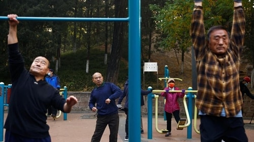 Elderly people exercising at a park in the morning (Photo by REUTERS) Elderly people exercising at a park in the morning (Photo by REUTERS)