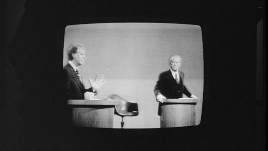 President Gerald Ford and Governor Jimmy Carter on television during the first presidential debate of the 1976 U.S. presidential election in Philadelphia, Pennsylvania, Library of Congress/Thomas J. O'Halloran/File Photo(Library of Congress)