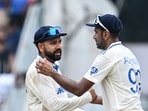 India's captain Rohit Sharma (L) celebrates with teammate Ravichandran Ashwin India's captain Rohit Sharma (L) celebrates with teammate Ravichandran Ashwin