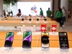 Apple iPhones are seen inside India's first Apple retail store during a media preview, a day ahead of its launch in Mumbai, India