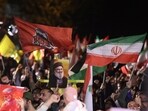 Iranians celebrate on a street after the IRGC attack on Israel, in Tehran, Iran, October 1, 2024.