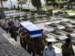 Soldiers carry the coffin of Israeli Army Capt. Eitan Yitzhak Oster, who was killed in Lebanon, during his funeral at Mt. Herzl military cemetery in Jerusalem, Wednesday, Oct. 2, 2024. Soldiers carry the coffin of Israeli Army Capt. Eitan Yitzhak Oster, who was killed in Lebanon, during his funeral at Mt. Herzl military cemetery in Jerusalem, Wednesday, Oct. 2, 2024.