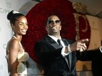 Sean "P. Diddy" Combs directs photographers as they sing "Happy Birthday," to him as his date Kim Porter, left, listens, after Combs arrived for his 35th birthday celebration at Cipriani on Wall Street in New York, Nov. 4, 2004. Sean "P. Diddy" Combs directs photographers as they sing "Happy Birthday," to him as his date Kim Porter, left, listens, after Combs arrived for his 35th birthday celebration at Cipriani on Wall Street in New York, Nov. 4, 2004.