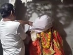 Members of self-proclaimed Hindu outfit Sanatan Rakshak Dal removing Sai Baba statues from a temple in Varanasi. Members of self-proclaimed Hindu outfit Sanatan Rakshak Dal removing Sai Baba statues from a temple in Varanasi.