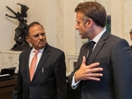National Security Adviser Ajit Doval with French President Emmanuel Macron on Monday evening. 