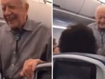 In the video, a smiling Carter can be seen shaking hands and greeting passengers onboard.