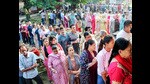 Jammu, Oct 01 (ANI): Voters wait in a queue to cast their votes for the final phase of the Jammu and Kashmir Assembly elections, at a polling station, in Jammu on Tuesday. (ANI Photo) (Shanky Rathore)
