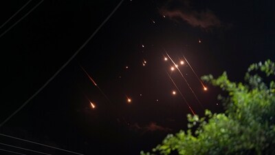 Missiles launched from Iran towards Israel streak across the night sky as seen from Deir al-Balah, Gaza Strip (AP) Missiles launched from Iran towards Israel streak across the night sky as seen from Deir al-Balah, Gaza Strip (AP)