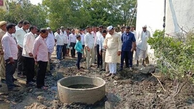 Alanda Congress MLA BR Patil inspects an underground water tank in Nimbarga village. (HT photo) Alanda Congress MLA BR Patil inspects an underground water tank in Nimbarga village. (HT photo)