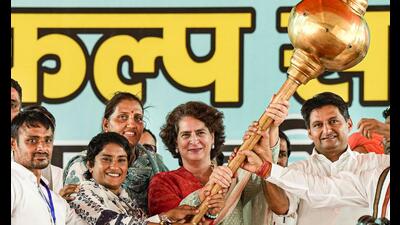 Congress leader Priyanka Gandhi Vadra holding a mace during the party's Haryana Vijay Sankalp Jansabha in Julana on Wednesday. (PTI) Congress leader Priyanka Gandhi Vadra holding a mace during the party's Haryana Vijay Sankalp Jansabha in Julana on Wednesday. (PTI)