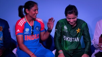 India captain Harmanpreet Kaur, left, shares a laugh with Pakistan captain Fatima Sana during a special panel session featuring captains of the 10 countries participating in the Women's T20 World Cup (AP) India captain Harmanpreet Kaur, left, shares a laugh with Pakistan captain Fatima Sana during a special panel session featuring captains of the 10 countries participating in the Women's T20 World Cup (AP)