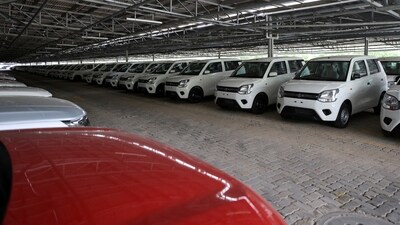 Cars are seen parked under solar panels at the manufacturing plant of Maruti Suzuki in Manesar, in the northern state of Haryana, India, September 26, 2023. (Anushree Fadnavis/Reuters)