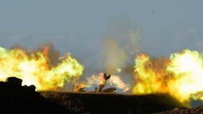 An Israeli mobile artillery unit fires a shell from northern Israel towards Lebanon. Oil prices rose as Iran launched missiles at Israel, prompting threats of retaliation and concerns over crude supply risks. (AP) An Israeli mobile artillery unit fires a shell from northern Israel towards Lebanon. Oil prices rose as Iran launched missiles at Israel, prompting threats of retaliation and concerns over crude supply risks. (AP)