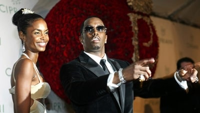 Sean "P. Diddy" Combs directs photographers as they sing "Happy Birthday," to him as his date Kim Porter, left, listens, after Combs arrived for his 35th birthday celebration at Cipriani on Wall Street in New York, Nov. 4, 2004. (AP) Sean "P. Diddy" Combs directs photographers as they sing "Happy Birthday," to him as his date Kim Porter, left, listens, after Combs arrived for his 35th birthday celebration at Cipriani on Wall Street in New York, Nov. 4, 2004. (AP)
