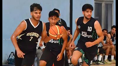 Players during the PU inter-college basketball championship at Guru Nanak Stadium in Ludhiana on Wednesday. (HT photo) Players during the PU inter-college basketball championship at Guru Nanak Stadium in Ludhiana on Wednesday. (HT photo)