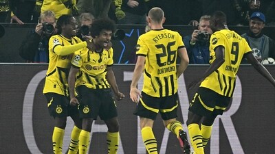 Dortmund's German forward #27 Karim Adeyemi celebrates with his team mates (AFP) Dortmund's German forward #27 Karim Adeyemi celebrates with his team mates (AFP)