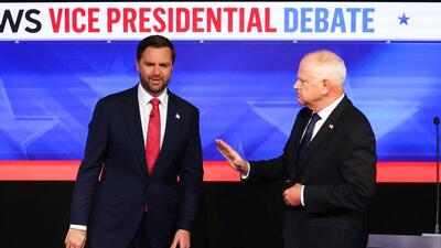 US senator and Republican vice presidential candidate J.D. Vance (L) and Minnesota Governor and Democratic vice presidential candidate Tim Walz arrive to participate in the Vice Presidential debate hosted by CBS News at the CBS Broadcast Center in New York City. (AFP)
