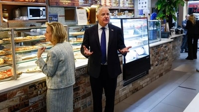 Tim Walz, the governor of Minnesota was spotted with Gwen at Justino's Pizza in Manhattan after nearly two hours of debate time against Trump's vice president pick. (Getty)