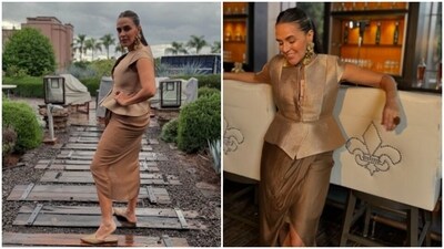 Neha added to the glam quotient in a golden co-ord set. The actor looked beautiful in a golden top with metallic finish and asymmetrical hem, teamed with matching satin skirt with wrapped details. (Instagram/@nehadhupia) Neha added to the glam quotient in a golden co-ord set. The actor looked beautiful in a golden top with metallic finish and asymmetrical hem, teamed with matching satin skirt with wrapped details. (Instagram/@nehadhupia)