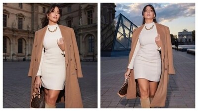 Nora Fatehi balanced the white and brown color palette beautifully in her ensemble. (Instagram/@norafatehimagic) Nora Fatehi balanced the white and brown color palette beautifully in her ensemble. (Instagram/@norafatehimagic)