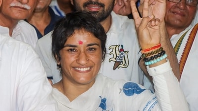 Former wrestler and Congress candidate from Julana constituency Vinesh Phogat during her nomination filing for the upcoming Haryana Assembly elections, in Jind district. (PTI) Former wrestler and Congress candidate from Julana constituency Vinesh Phogat during her nomination filing for the upcoming Haryana Assembly elections, in Jind district. (PTI)