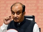 BJP MP Dr Sudhanshu Trivedi addresses a press conference at party headquarters.