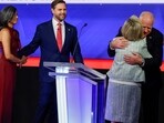 Democratic vice presidential candidate Minnesota Gov. Tim Walz and his wife Gwen Walz (R) embrace as Republican vice presidential candidate Sen. JD Vance (R-OH) and his wife Usha Vance Democratic vice presidential candidate Minnesota Gov. Tim Walz and his wife Gwen Walz (R) embrace as Republican vice presidential candidate Sen. JD Vance (R-OH) and his wife Usha Vance