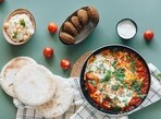 Shakshuka, Falafel, Hummus, and Pita Bread are some popular foods of the Mediterranean diet. Shakshuka, Falafel, Hummus, and Pita Bread are some popular foods of the Mediterranean diet.