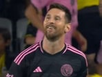 Lionel Messi celebrates after scoring a free-kick goal Lionel Messi celebrates after scoring a free-kick goal