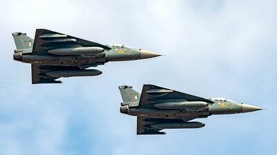 LCA Tejas flying during the 2021 air show at Air Force Station, Yelahanka, in Bengaluru. (ANI Photo) LCA Tejas flying during the 2021 air show at Air Force Station, Yelahanka, in Bengaluru. (ANI Photo)