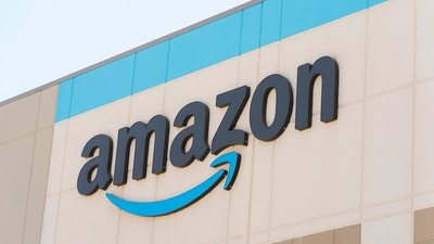 The Amazon logo is seen on the exterior wall of the Amazon OXR1 fulfillment center in Oxnard, Calif., on Wednesday, Aug. 21, 2024. (AP Photo/Damian Dovarganes) (AP) The Amazon logo is seen on the exterior wall of the Amazon OXR1 fulfillment center in Oxnard, Calif., on Wednesday, Aug. 21, 2024. (AP Photo/Damian Dovarganes) (AP)