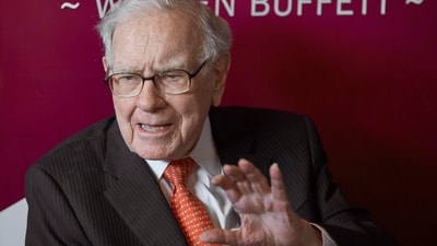 Warren Buffett, Chairman and CEO of Berkshire Hathaway, speaks during a game of bridge after the annual Berkshire Hathaway shareholders meeting in Omaha. (AP) Warren Buffett, Chairman and CEO of Berkshire Hathaway, speaks during a game of bridge after the annual Berkshire Hathaway shareholders meeting in Omaha. (AP)