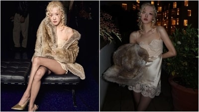 Blackpink member Rosé attended the Saint Laurent show in Paris. The singer embraced the risqué style statement by wearing a lace-embroidered champagne slip dress. She paired the dress with an oversized fur coat, statement earrings, champagne stilettos, and striking glam. Blackpink member Rosé attended the Saint Laurent show in Paris. The singer embraced the risqué style statement by wearing a lace-embroidered champagne slip dress. She paired the dress with an oversized fur coat, statement earrings, champagne stilettos, and striking glam. 