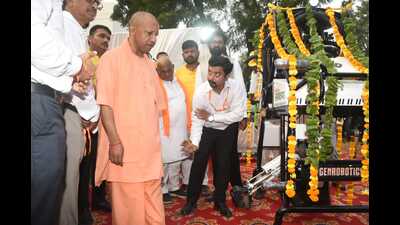 CM Yogi Adityanath seeing the Bandicoot— a robotic machine for cleaning manholes—gifted to the Gorakhpur Municipal Corporation on October 3. (HT photo) CM Yogi Adityanath seeing the Bandicoot— a robotic machine for cleaning manholes—gifted to the Gorakhpur Municipal Corporation on October 3. (HT photo)