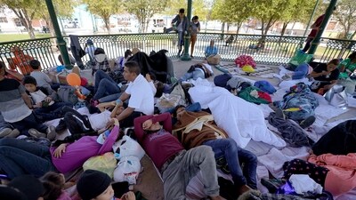 A group of migrants rest on a gazebo at a park after the deportees from the U.S. were pushed by Mexican authorities off an area they had been staying after their expulsion on March 20, 2021 (Pic for representation) (AP) A group of migrants rest on a gazebo at a park after the deportees from the U.S. were pushed by Mexican authorities off an area they had been staying after their expulsion on March 20, 2021 (Pic for representation) (AP)
