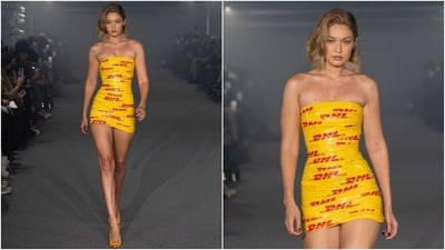 Bella's sister, Gigi Hadid, made heads turn at the Vetements Spring Summer 2025 collection. The American model wore a strapless mini dress made out of courier service DHL tape wrapped around her body. She matched the look with yellow pumps featuring DHL patterns. Bella's sister, Gigi Hadid, made heads turn at the Vetements Spring Summer 2025 collection. The American model wore a strapless mini dress made out of courier service DHL tape wrapped around her body. She matched the look with yellow pumps featuring DHL patterns. 